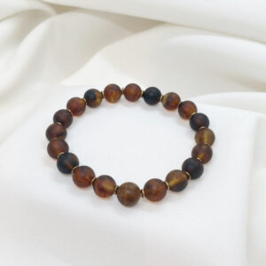 Bransoletka z matowego koniakowego bursztynu i pozłacanego srebra 925