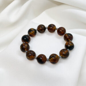 Bransoletka z dużych kulek bursztynu koniakowo‑zielonego i srebra 925