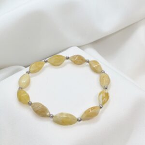 Bransoletka z mlecznego bursztynu z kulkami ze srebra 925