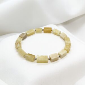 Bransoletka z prostokątów mlecznego bursztynu i srebrnych kulek 925