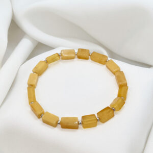 Bransoletka z prostokątów mleczno-żółtego bursztynu i srebrnych kulek 925